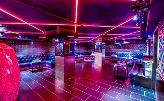 Bonbonniere nightclub with neon ceiling and the egg DJ booth