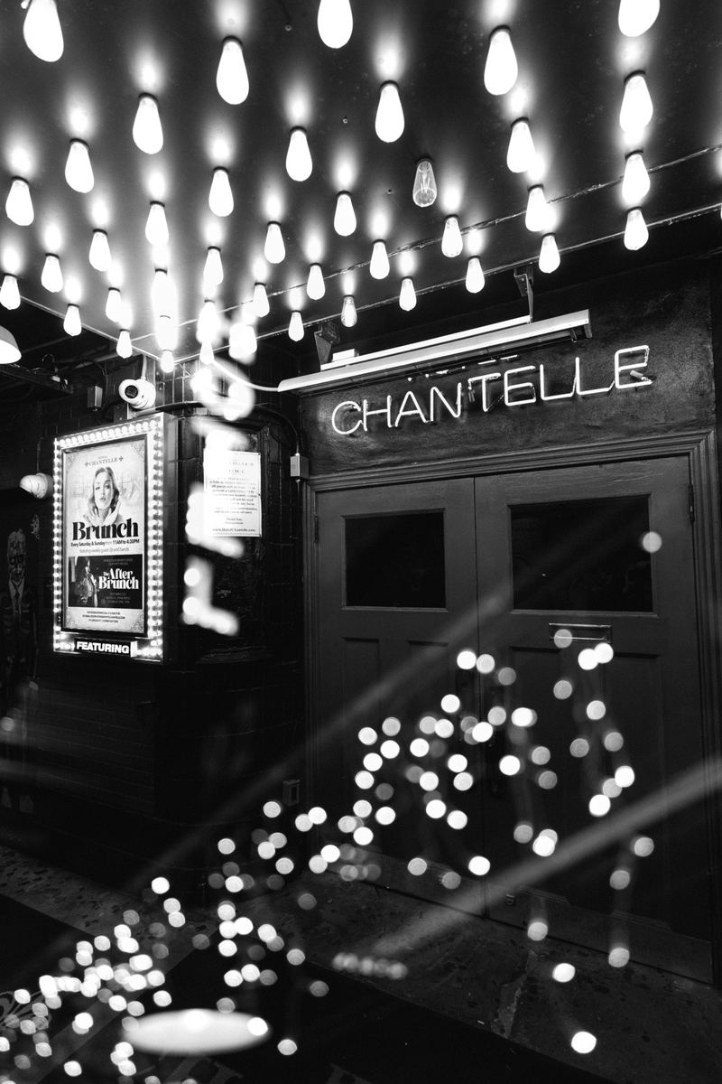 The front doors under the marquee lights