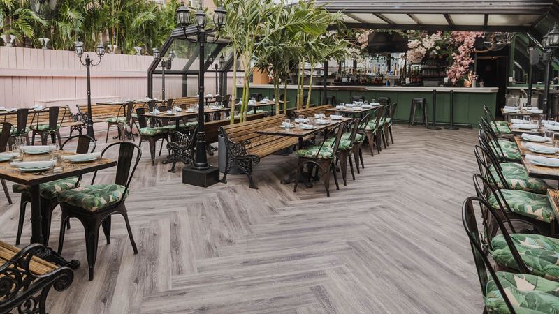 Rooftop dining room with vintage lamp posts